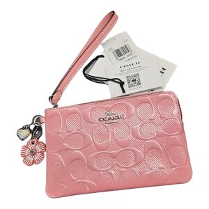 NWT Coach Pink Patent Signature Embossed Wristlet Clutch + 2 Charms
